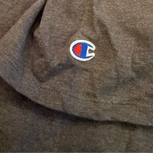 Champion Dark Gray Tee with Logo Patch. Size L